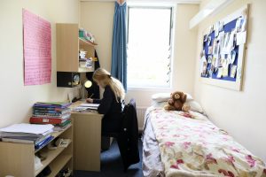 girl studying in her dorm room