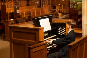 student playing the piano